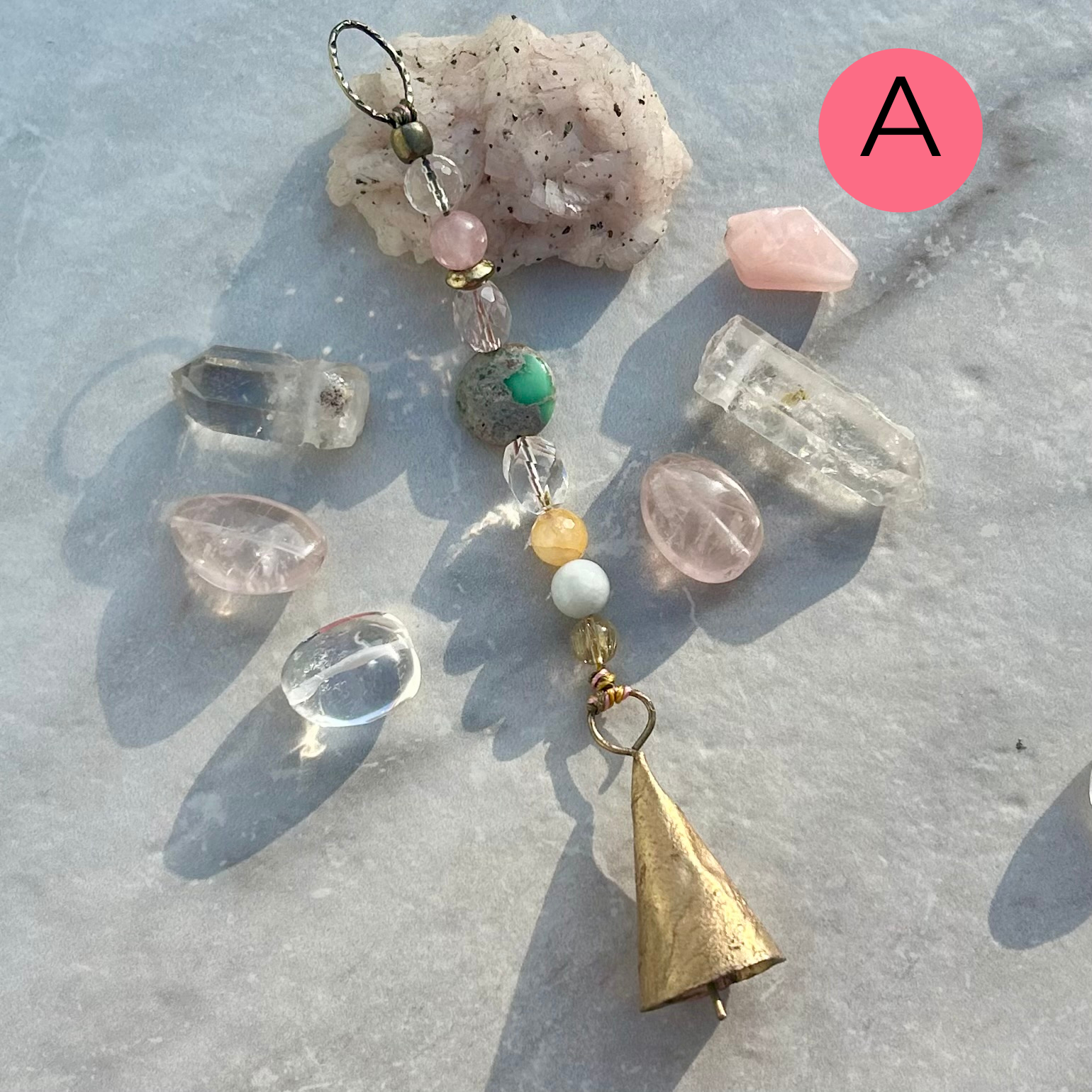 spiritual bell charm with gemstone accents crystal quartz, variscite, rose quartz, rutilated quartz
